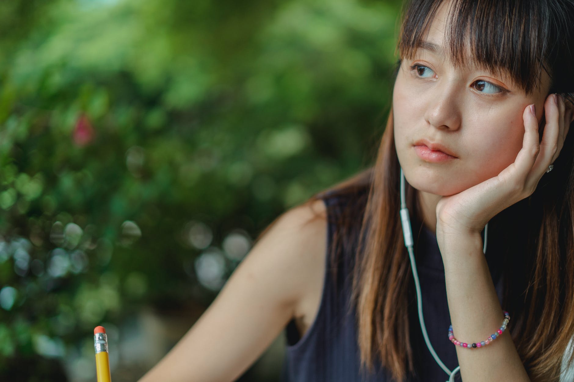 Girl thinks about how to restate a thesis